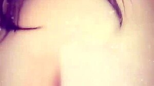 Japanese MILF Poses in Shiny Blue Satin Webcam Show