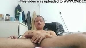 Hey, watch this hot guy strip then stroke his cock hard