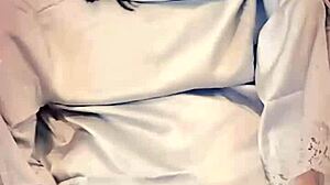 Japanese MILF Poses in Shiny Blue Satin Webcam Show