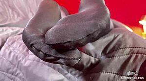 Anthracite nylon feet tease rubbing close to face