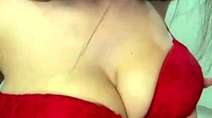 my busty stepmom massages her huge natural tits making me throb with desire