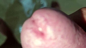 ASMR male gets infinite handjob on hard cock with intense moans and powerful cumshot