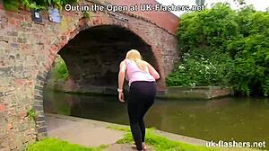 Chubby British MILF amateur flashes big ass belly outdoors publicly