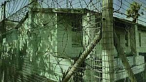 Dominatrix Mistress April Brutally Strap-on Fucks Bound Slave in Military Interrogation Camp