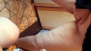 Three girlfriends wildly masturbate in kitchen hostel close-up