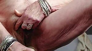 granny shoves dildo deep into her hairy german pussy