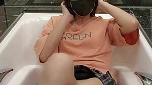 ting xuan soaks her shemale body in wet clothes bath