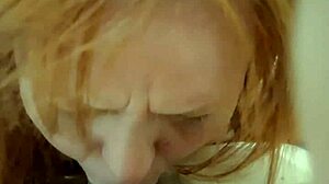 Porcelain redhead doll gags on full cock in deepthroat training