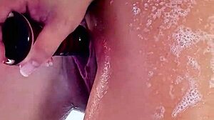 Savanah Storm Fucks Glass Dildo In Tub By Pool