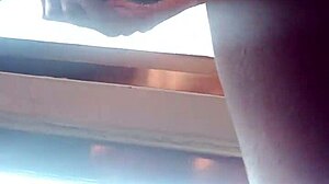 Skinny tattooed guy jerks monster cock publicly by bedroom window moaning