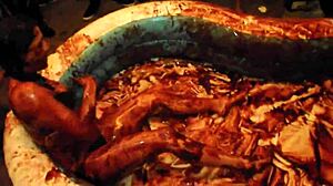 King Cures hosts chocolate model wrestling olympics by the pool