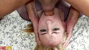 gorgeous blonde gags zero on huge cock throat thrusts