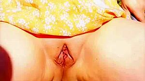 mature wife spreads her huge shaved pussy lips wide outdoors flashing wet