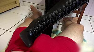 i love giving footjobs in my long leather boots until cum fills pants