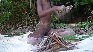 skinny african girl cooks medicine naked for grandma in forest