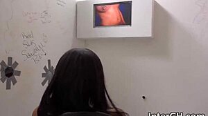 ebony babe deepthroats through glory hole bent over for interracial cock