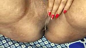 desi bhabhi moans rubbing her wet pussy close-up