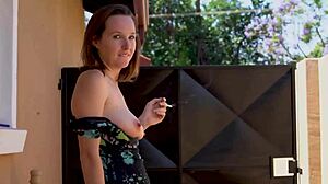 Petite Brunette Neighbor Smokes and Exposes Big Tits Outdoors