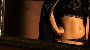 lovely indian milf strips naked teases big tits bed