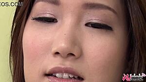 mikuni maisaki teases wet pussy with toy on couch