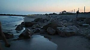 blonde flashes tits then deepthroats cock on crowded beach