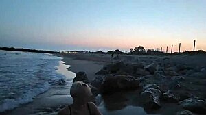 blonde flashes tits then deepthroats cock on crowded beach
