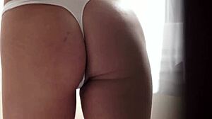 Gorgeous Eurobabe spreads legs teasing pussy before erotic masturbation