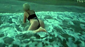 blonde flashes tits then deepthroats cock on crowded beach