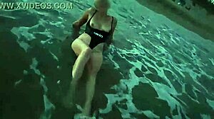 blonde flashes tits then deepthroats cock on crowded beach