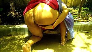 desi huge ass stepmom fingers pussy pees courtyard outdoor?