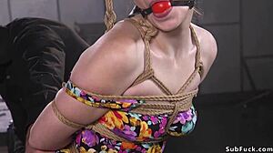 A pale slave girl submits as huge cock ravages her bound body completely