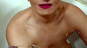 GERMAN PROSTITUTE BITCH MILF SANDRA DRINKS GOLDEN SHOWER PISS!