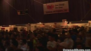 Naughty brunette rips clothes dancing wildly!