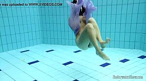 Aneta flaunts big tits purple dress poolside underwater