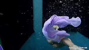 Aneta flaunts big tits purple dress poolside underwater