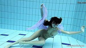 Aneta flaunts big tits purple dress poolside underwater