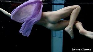 Aneta flaunts big tits purple dress poolside underwater