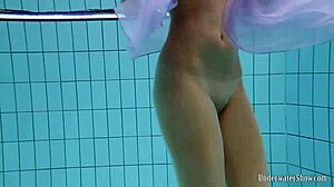 Aneta flaunts big tits purple dress poolside underwater
