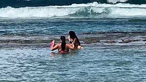 two sexy brazilians kiss big asses beachside