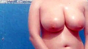 Seductive milf wife caught on hidden bathroom cam fingering wet tits and ass