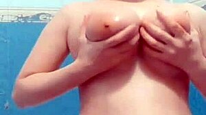 Seductive milf wife caught on hidden bathroom cam fingering wet tits and ass