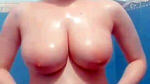 Seductive milf wife caught on hidden bathroom cam fingering wet tits and ass