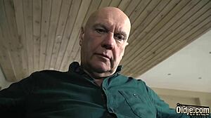 blonde babe spreads legs n pussy fer ol' man's cock