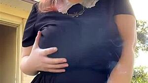 Alt milf neighbor smokes while flashing her thong