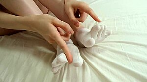 she teases with toe socks footjob punishing her slave guy