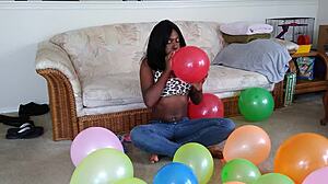 Ebony French Fetish: Balloons and Big Tits Tease