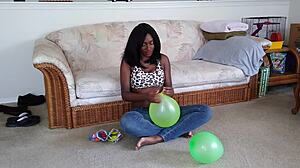 Ebony French Fetish: Balloons and Big Tits Tease