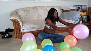Ebony French Fetish: Balloons and Big Tits Tease