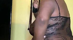 ebony femdom tongue worships big tits and ass for verification