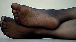 check out my wife's sexy feet in nylon pantyhose